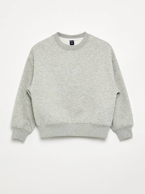 Sudadera jaspeada con detalles de perlas - Kiabi Sudadera jaspeada con detalles de perlas - Kiabi