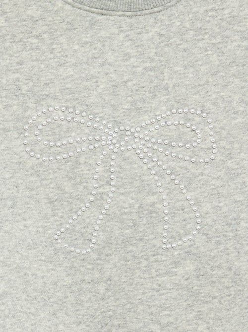 Sudadera jaspeada con detalles de perlas - Kiabi Sudadera jaspeada con detalles de perlas - Kiabi