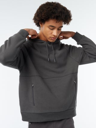 Sudadera lisa con capucha y bolsillos con cremallera