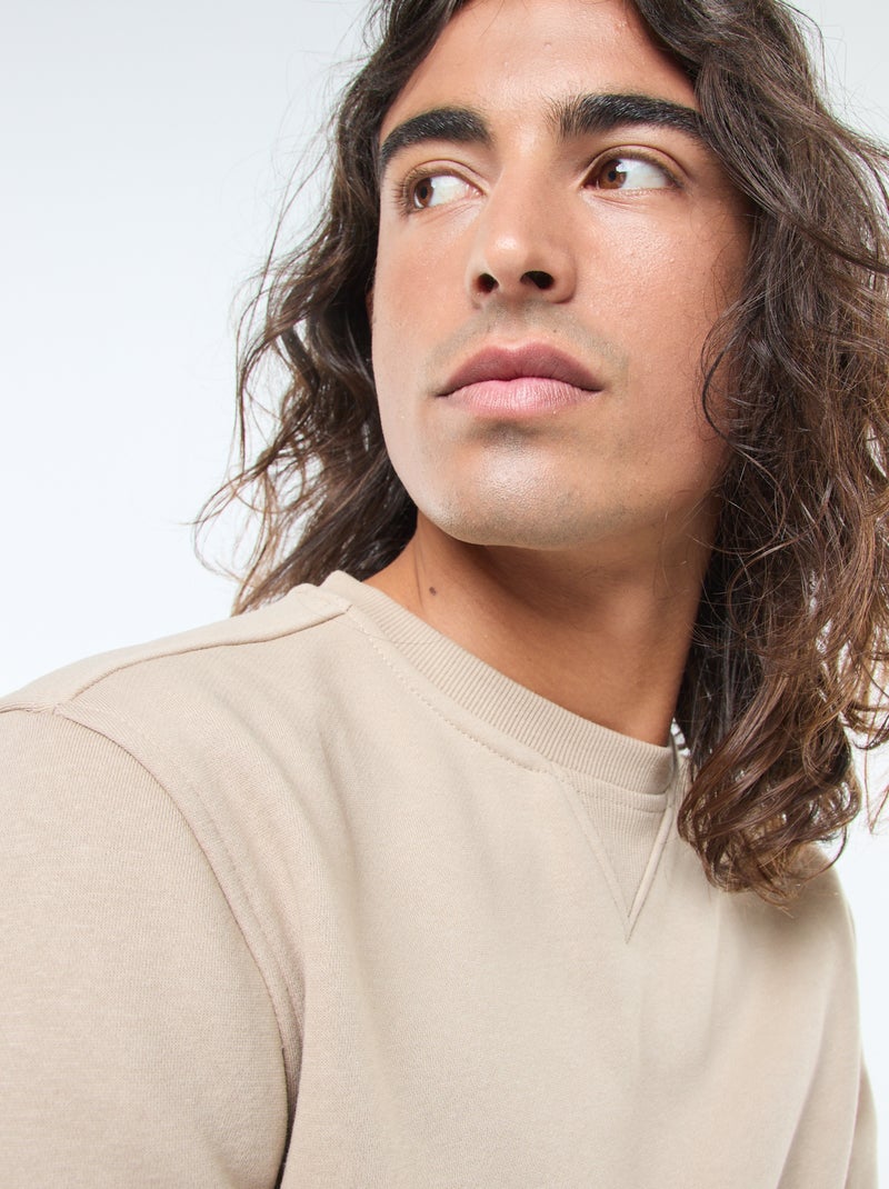 Sudadera lisa de cuello redondo en felpa perchada Beige - Kiabi