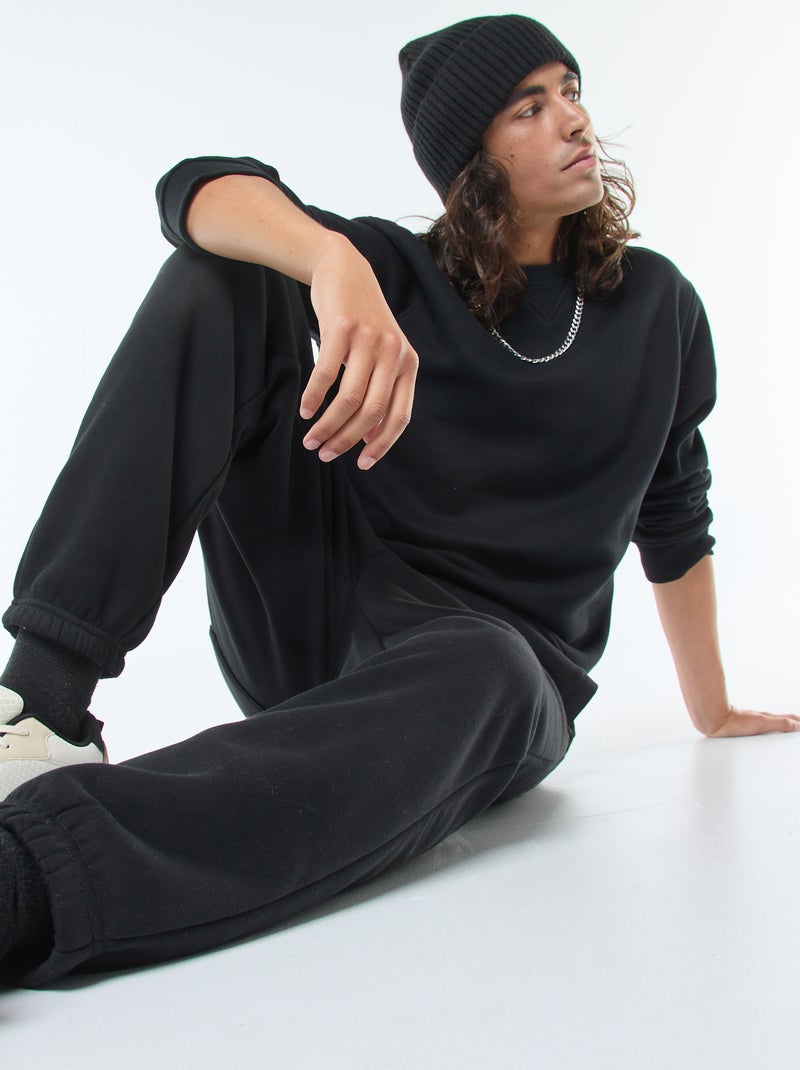 Sudadera lisa de cuello redondo en felpa perchada Negro - Kiabi