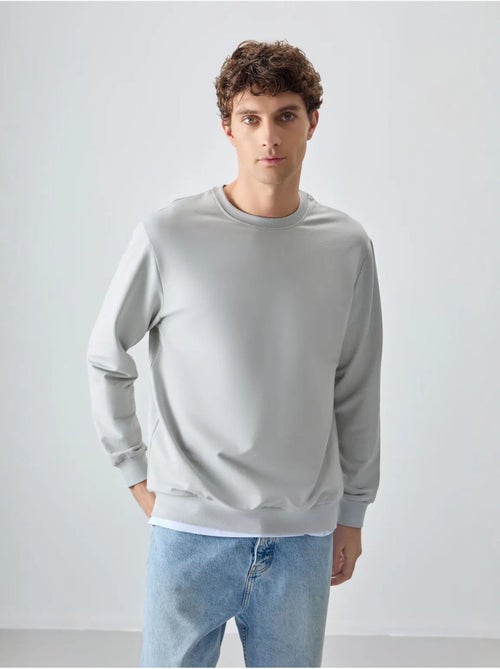 Sudadera lisa de hombre con cuello redondo tommy - Kiabi Sudadera lisa de hombre con cuello redondo tommy - Kiabi