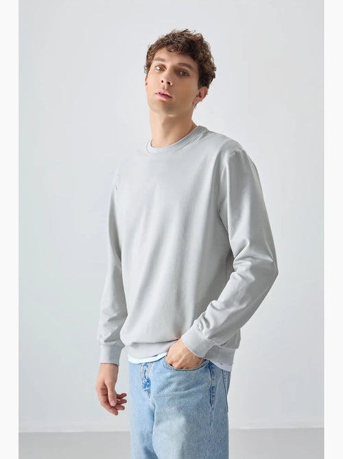 Sudadera lisa de hombre con cuello redondo tommy - Kiabi Sudadera lisa de hombre con cuello redondo tommy - Kiabi
