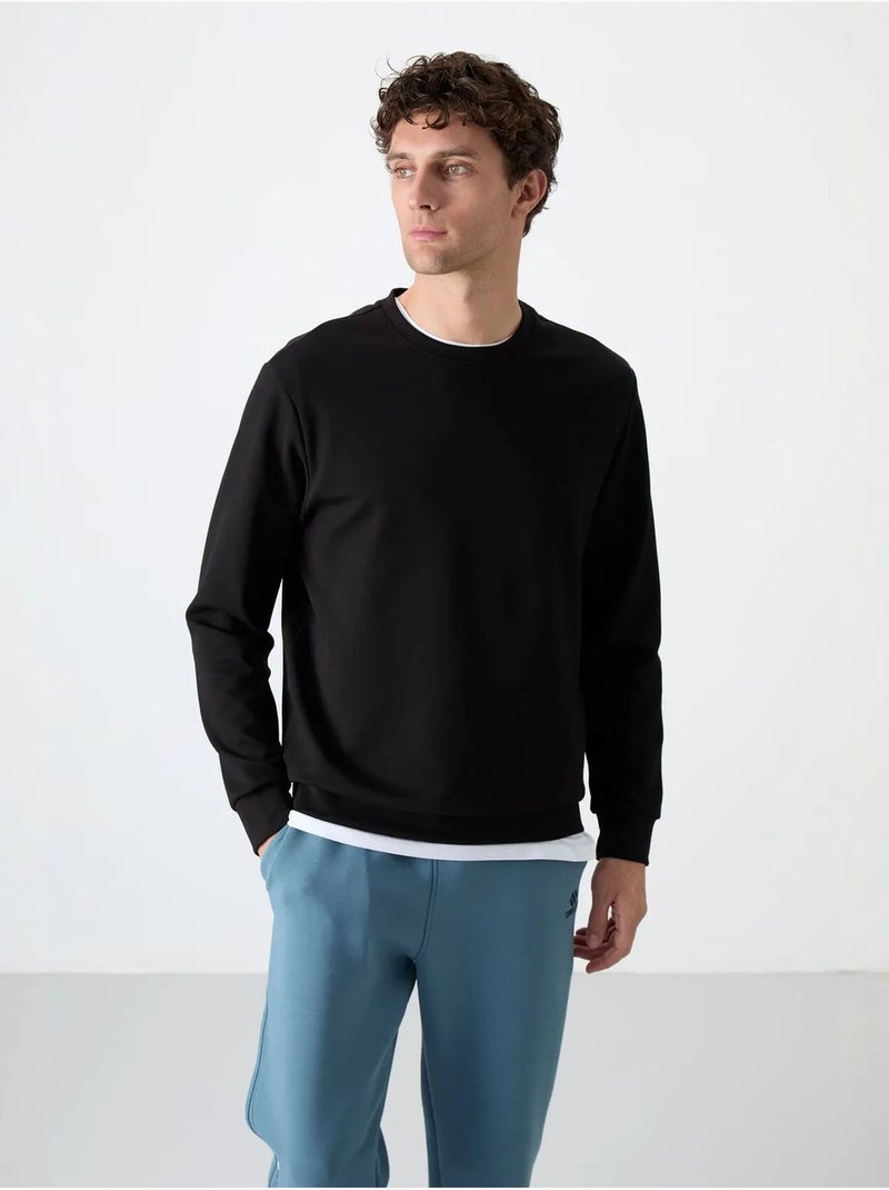 Sudadera lisa de hombre con cuello redondo tommy Negro - Kiabi