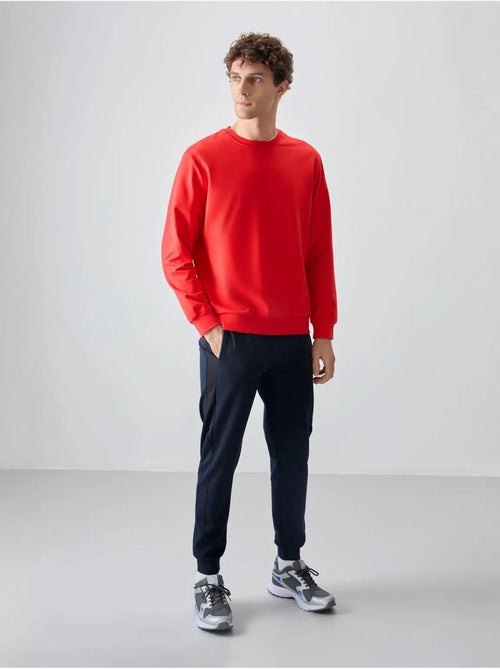 Sudadera lisa de hombre con cuello redondo tommy - Kiabi Sudadera lisa de hombre con cuello redondo tommy - Kiabi