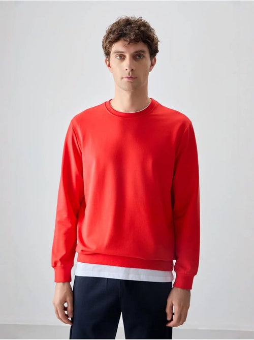 Sudadera lisa de hombre con cuello redondo tommy - Kiabi Sudadera lisa de hombre con cuello redondo tommy - Kiabi