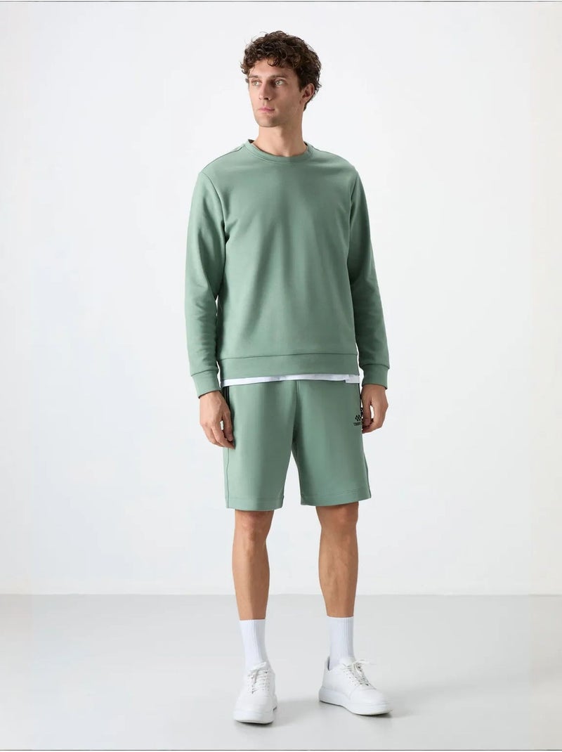 Sudadera lisa de hombre con cuello redondo tommy Verde - Kiabi