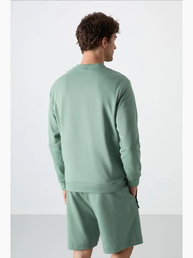 Sudadera lisa de hombre con cuello redondo tommy Verde - Kiabi