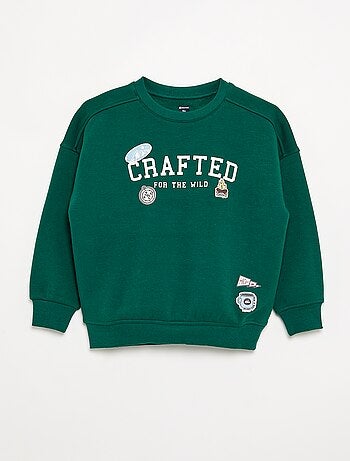 Sudadera oversize con múltiples parches