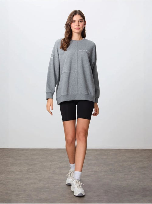 Sudadera oversize de cuello redondo tommy - Kiabi Sudadera oversize de cuello redondo tommy - Kiabi