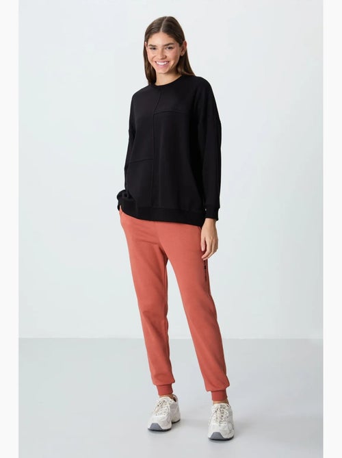 Sudadera oversize de cuello redondo tommy - Kiabi Sudadera oversize de cuello redondo tommy - Kiabi