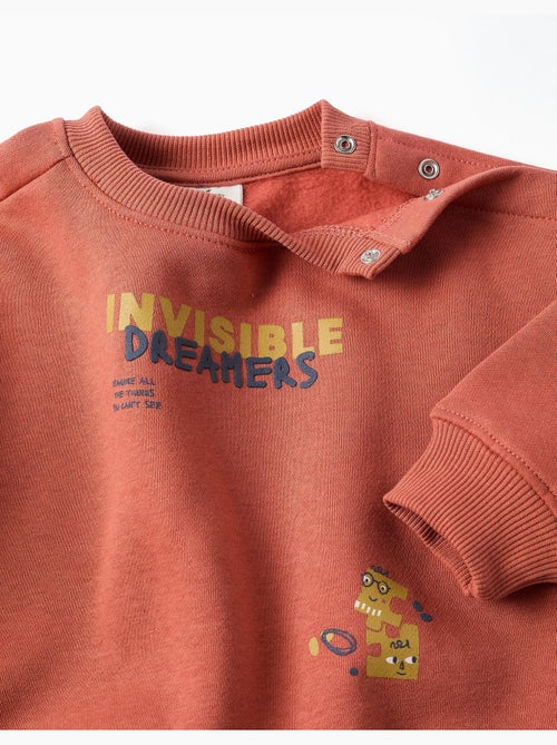Sudadera perchada con estampado Invisible Dreamers - Kiabi Sudadera perchada con estampado Invisible Dreamers - Kiabi