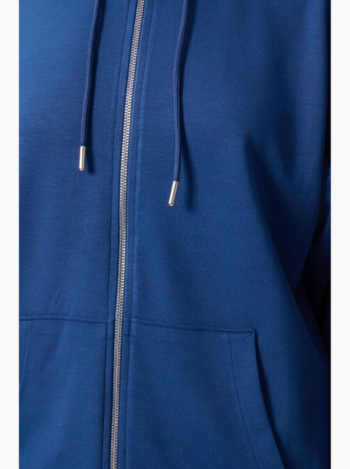 Sudadera túnica larga oversize con capucha y cremallera tommy - Kiabi Sudadera túnica larga oversize con capucha y cremallera tommy - Kiabi
