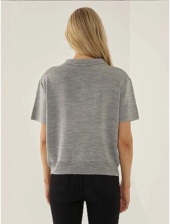 Suéter con cuello polo y cremallera