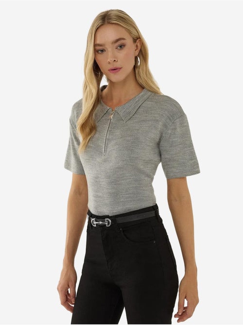 Suéter con cuello polo y cremallera - Kiabi Suéter con cuello polo y cremallera - Kiabi