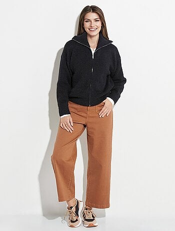 Suéter de punto con cremallera y cuello alto