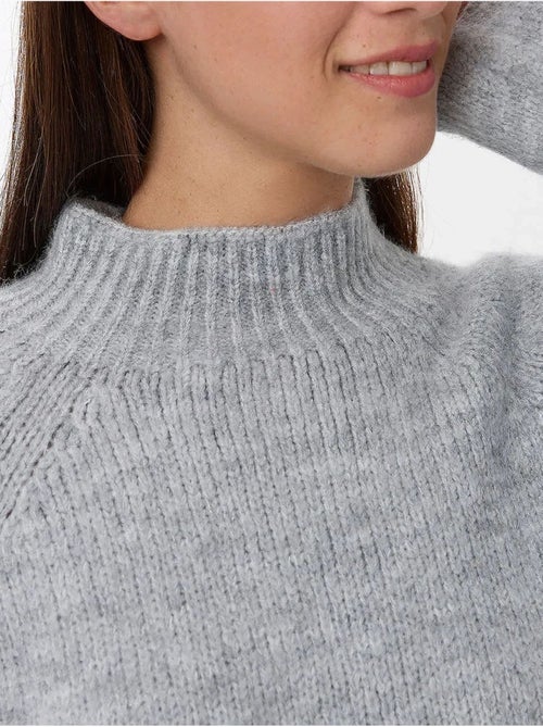 Suéter de punto de cuello alto de gran tamaño - Kiabi Suéter de punto de cuello alto de gran tamaño - Kiabi