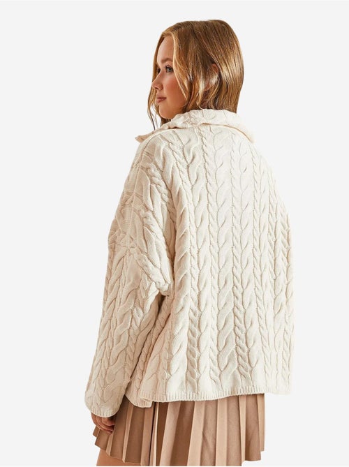 Suéter de punto estampado con cuello alto y cremallera de bianco lucci - Kiabi Suéter de punto estampado con cuello alto y cremallera de bianco lucci - Kiabi