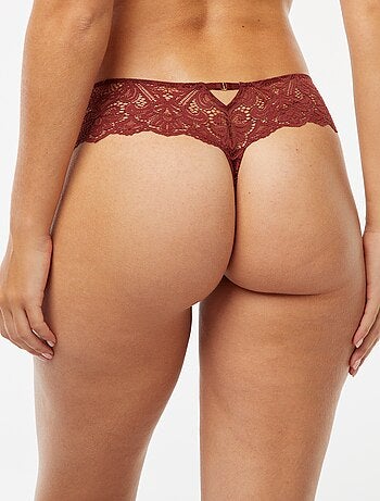 Tanga de encaje transparente con joya fantasía