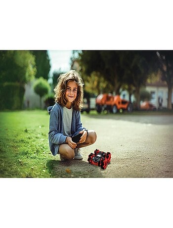 Tobogán Crosslander®, doble cara con rotación de 360° y efectos luminosos.