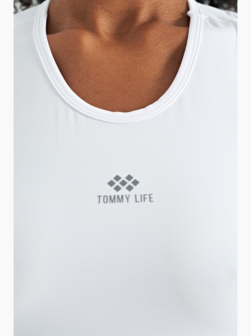 Top active sin mangas con cuello redondo tommy Blanco - Kiabi