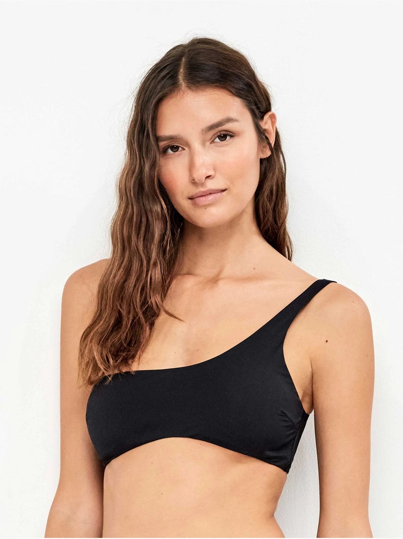 Top bikini asimétrico sin aro y foam extraíble en liso Negro - Kiabi