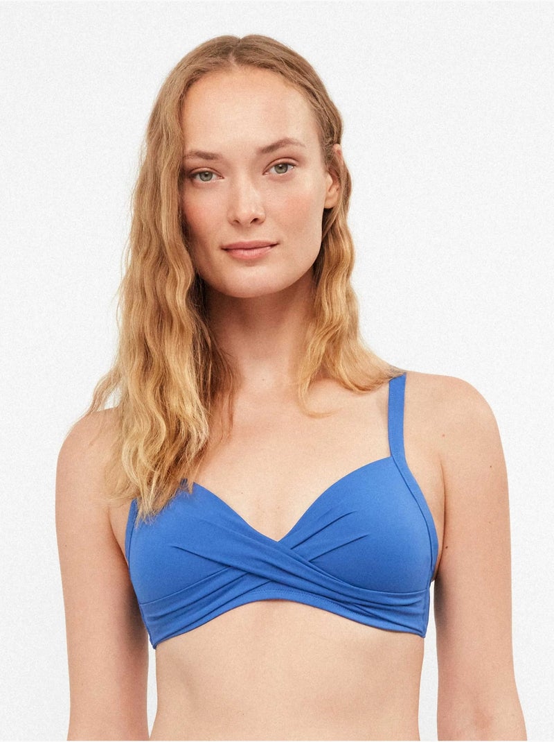Top bikini capacidad sin aro, con foam y cruce en escote Azul - Kiabi