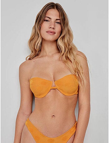 Top bikini desmontable con aro y foam en tejido con soles