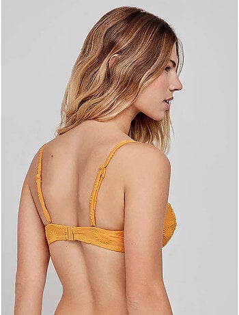 Top bikini desmontable con aro y foam en tejido con soles
