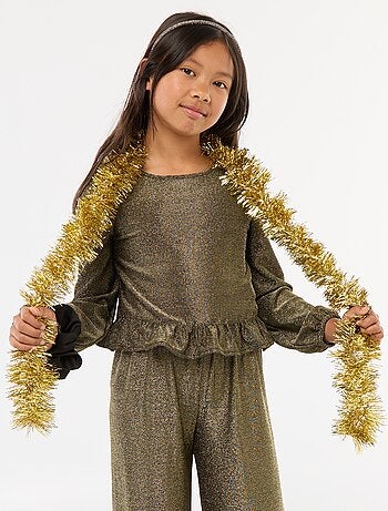 Top brillante de punto con besos y volante