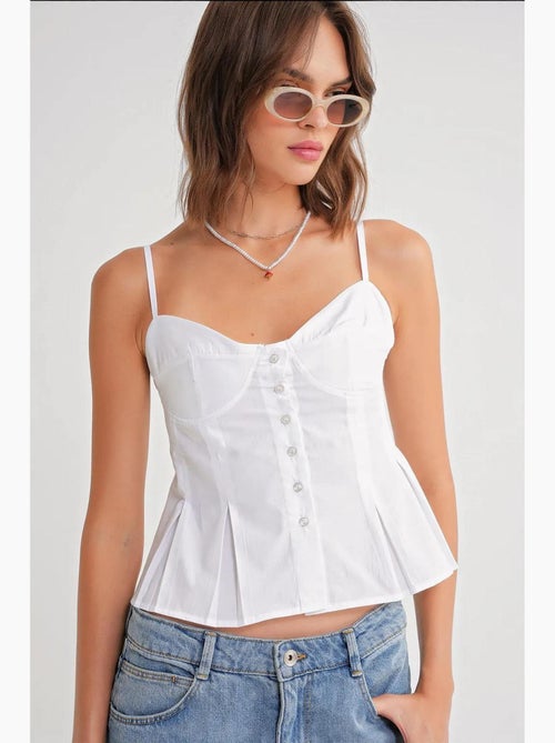 Top cami con escote corazón, botones delanteros y peplum mixray - Kiabi Top cami con escote corazón, botones delanteros y peplum mixray - Kiabi