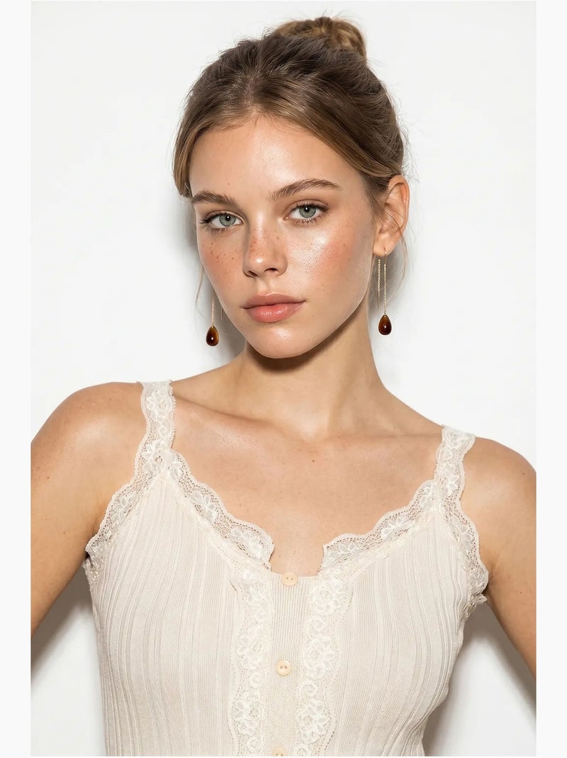Top camisola cropped entallado con botones lucci Crema - Kiabi