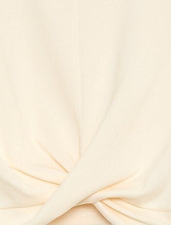 Top corto de manga larga