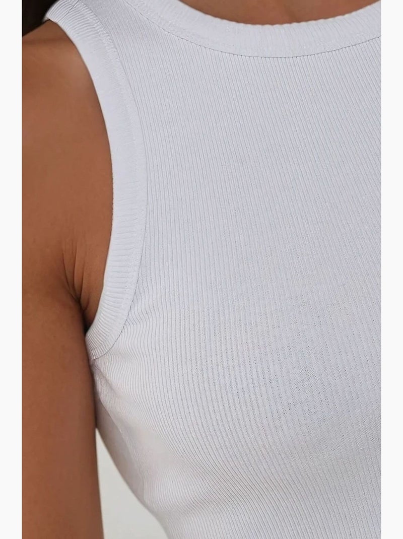 Top corto de punto acanalado sin mangas con cuello redondo hiccup Blanco - Kiabi