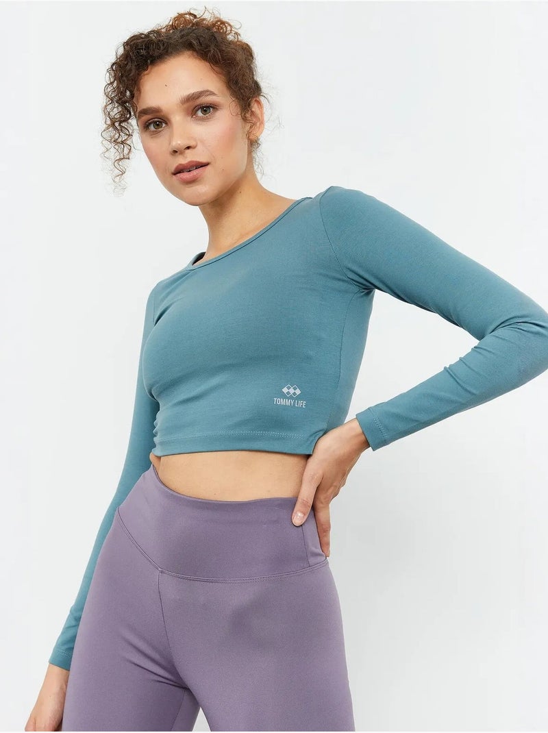 Top corto slim fit de manga larga tommy Azul petróleo - Kiabi