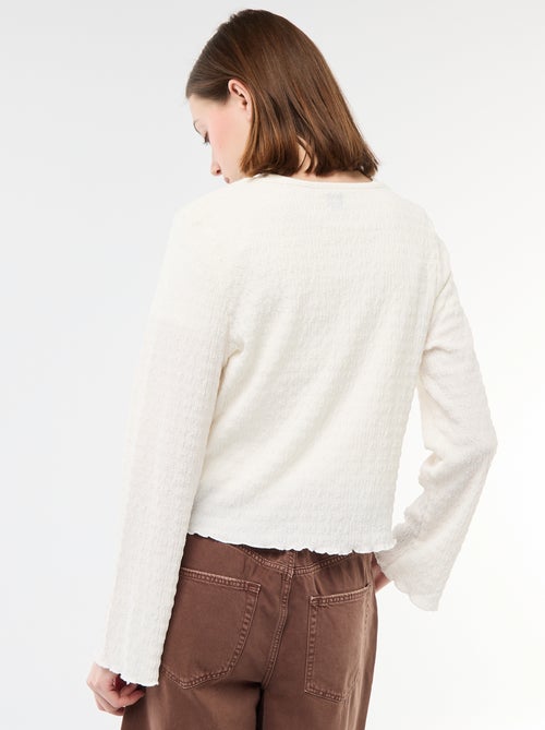 Top cuello en pico de punto abotonado - Kiabi Top cuello en pico de punto abotonado - Kiabi