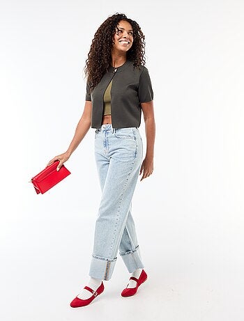 Top de punto con cierre en el cuello