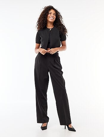 Top de punto con cierre en el cuello