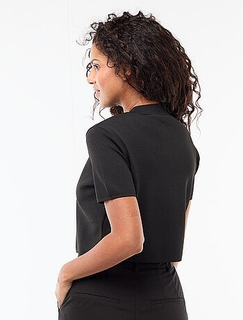 Top de punto con cierre en el cuello