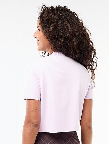 Top de punto con cierre en el cuello