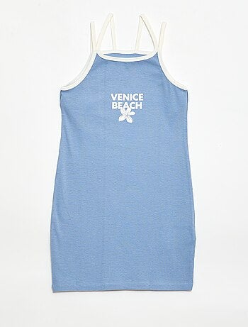 Top de tirantes finos y estampado en el pecho