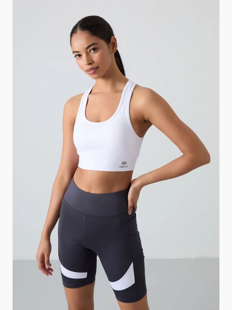 Top deportivo crop ajustado sin mangas tommy Blanco Azul - Kiabi