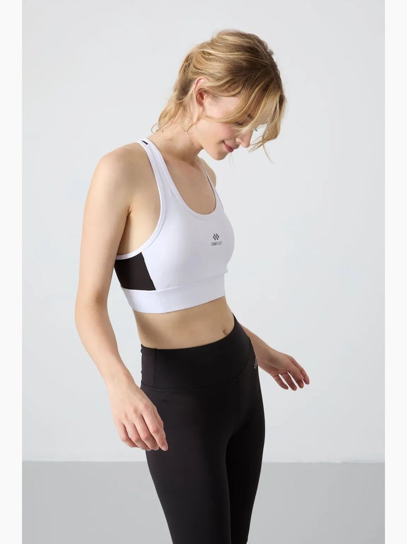 Top deportivo crop ajustado sin mangas tommy Blanco - Kiabi
