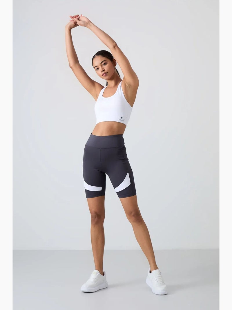 Top deportivo crop ajustado sin mangas tommy Negro Blanco - Kiabi