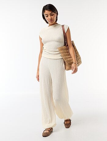 Top elástico liso asimétrico sin mangas