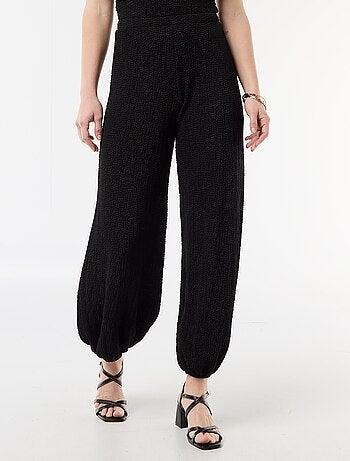 Top elástico liso asimétrico sin mangas