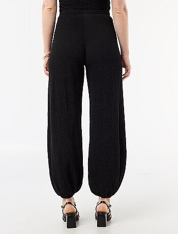 Top elástico liso asimétrico sin mangas