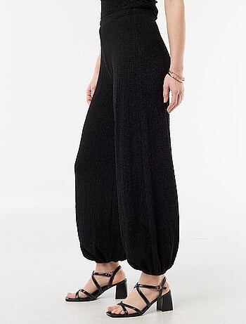 Top elástico liso asimétrico sin mangas