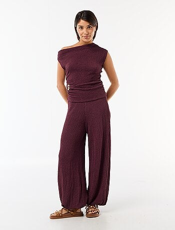 Top elástico liso asimétrico sin mangas