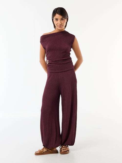 Top elástico liso asimétrico sin mangas - Kiabi